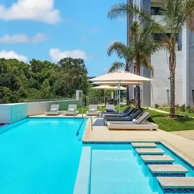 Luxury 2BR Loft with Patio Near Menlyn at the Regency