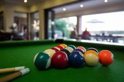a group of billiard balls on a pool table at Buffalo Brooke in Hectorspruit