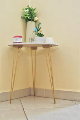 a table with a vase on top of it at LEMEK Heights in Ga-Mothiba