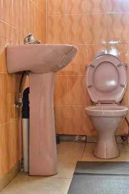 a bathroom with a sink and a toilet at LEMEK Heights in Ga-Mothiba
