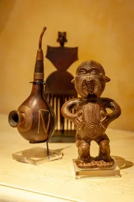 a statue of a god next to a vase at Lejwe La Metsi Private Reserve in Bela-Bela