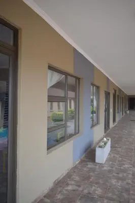 a row of windows on the side of a building at Ko-Khoneng Guest house in Lebowakgomo