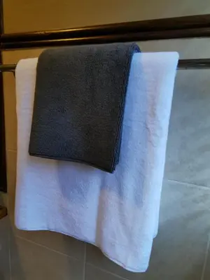 a towel on a towel rack in a bathroom at Private Apartment for business and leisure Pretoria East in Pretoria