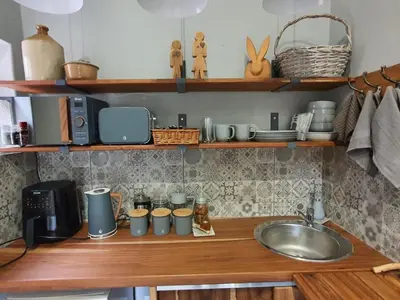 a kitchen with a sink and a counter top with a sink at Bendor Garden Flat in Polokwane