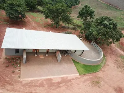 an overhead view of a white bench in a park at Tshivhase Nature Reserve in Vhutandabos