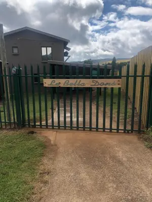 a gate with a sign that reads no living space at Le Bella Dons in Graskop