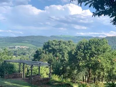 a gazebo on a hill with mountains in the background at Hazyview Accommodation, Bon Repose Cottage 2 in Hazyview