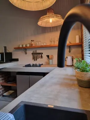 a kitchen with a counter top with a sink at UmnDeni Africa in Hoedspruit