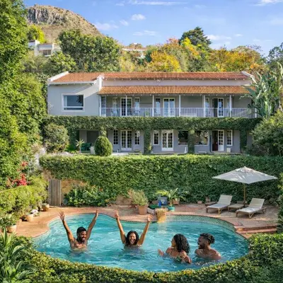 a group of people in a swimming pool at Ekhaya in Hartbeespoort