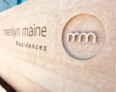 a sign for the miamimite institute ofresurrectionlishes at Menlyn Maine Residences - Superior king - Paris apartment in Pretoria