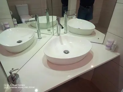 a bathroom with two sinks in front of a mirror at 4 on Verbena in Boksburg
