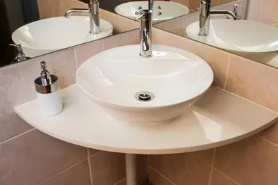 a white sink in a bathroom with two mirrors at 4 on Verbena in Boksburg
