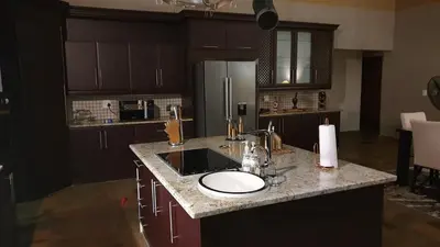 a kitchen with a sink and a counter top at 113 Zwartkloof Private Game Reserve Bela-Bela in Bela-Bela