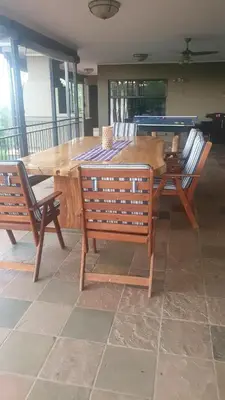 two benches and a table and a pool table at 113 Zwartkloof Private Game Reserve Bela-Bela in Bela-Bela