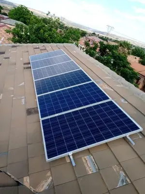 an array of solar panels on the roof of a house at TLZ Prop B&B in Pretoria