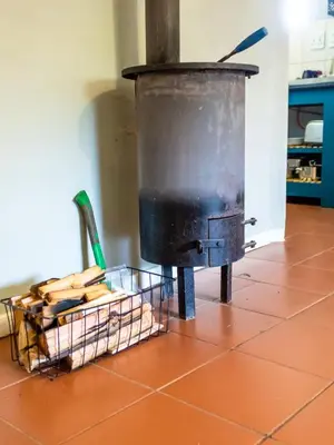 a kitchen with a stove in a room at Wellstead Country Manor in Haenertsburg