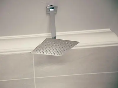 a metal object hanging from the ceiling in a bathroom at Wilson Guest House in Groblersdal