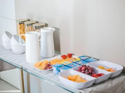 a table with a tray of fruit on a counter at Wilson Guest House in Groblersdal