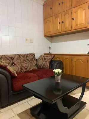 a living room with a couch and a coffee table at Serenity Garden Place in Hazyview