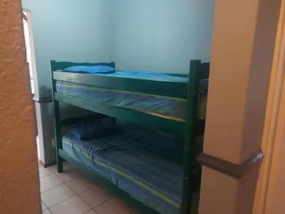a room with two bunk beds in a room at Pendleberry Holiday Resort - Unit 40 in Bela-Bela