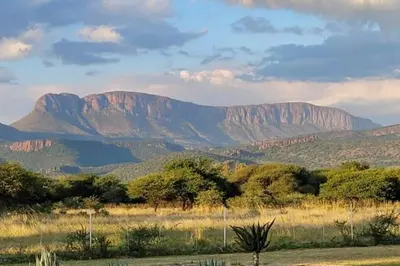 a view of a mountain range with mountains in the background at Vanross Self Catering Accommodation in Thabazimbi