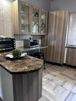 a kitchen with a counter and a counter top at Banabaka spa and venue in White River
