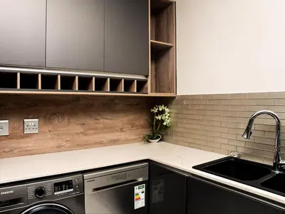 a kitchen with a sink and a dishwasher at Sou House in Louis Trichardt