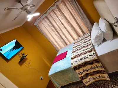 a bed in a room with a window and a bed sidx sidx at WAMPEX GUEST HOUSE IN NORTHAM CBD 239 COAL STREET in Northam
