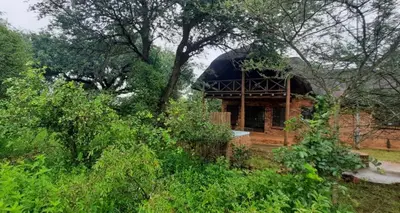 a large building with a dome on top of it at Intundla's Rest in Marloth Park