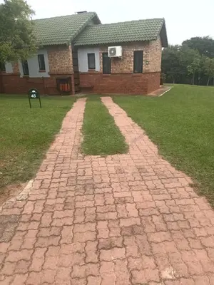 a brick driveway in front of a house at Penny's Place on Greenway in White River