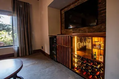 a room with a wine rack with wine bottles at Lapeng Guest Lodge in Burgersfort