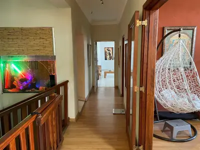 a hallway with a fish tank in a room at Royal Views in Hartbeespoort