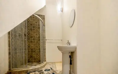 a bathroom with a sink and a shower at 54 Brecher in Pretoria