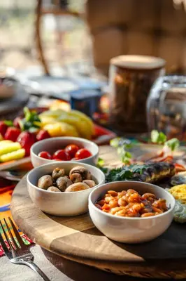 a table with bowls of food on a wooden board at Grace of Africa Boutique Safari Lodge in Marloth Park