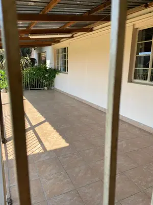 an outside view of a porch with a patio at Enon in Haenertsburg