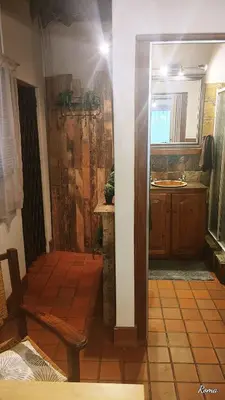 a bathroom with a shower and a sink in a room at Casa'Roma in Pretoria