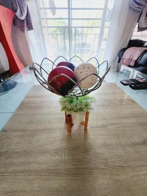 a basket of hats sitting on top of a table at Red Peppers in Pretoria