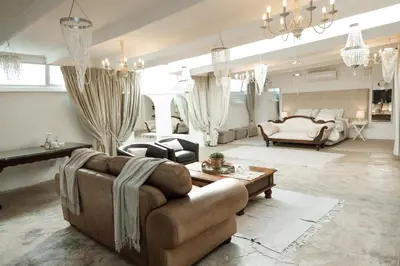 a living room with a couch and a table at 55 Tulbagh events and wedding venue in Kempton Park