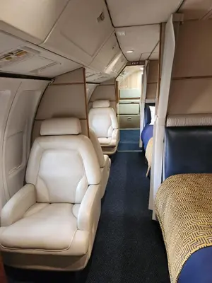 a row of seats in the back of an airplane at AEROTEL VIP in Hoedspruit