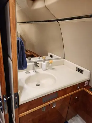 a bathroom with a sink and a mirror at AEROTEL VIP in Hoedspruit