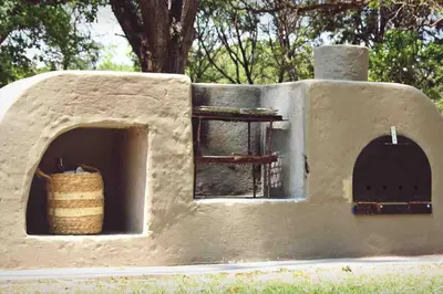 an outdoor oven with a basket inside of it at Hot Spring bungalow in Limpopo in Gemsbokfontein