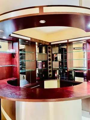 a bar in a restaurant with a counter top at Airport Royal Guest House in Kempton Park