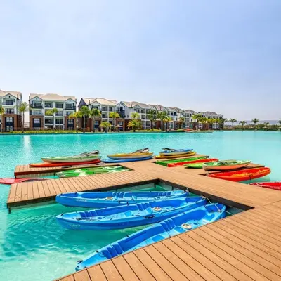 a group of boats on a dock in the water at The blyde-Luxury one bedroom apartment in Pretoria