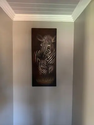 a painting of a zebra on a wall at The Villa 442 in Pretoria