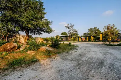 an empty road in front of some houses at SleepOver Phabeni in Hazyview