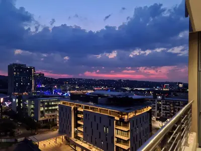 a view of a city skyline at night at 11 Floors in the Sky - Luxurious 1 Bedroom in Pretoria