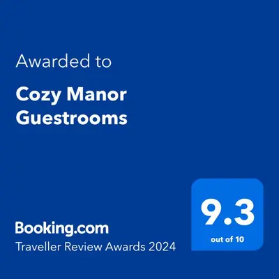 a screenshot of a phone with the text awarded to cozy man customer questions at Cozy Manor Guestrooms in Lyttelton
