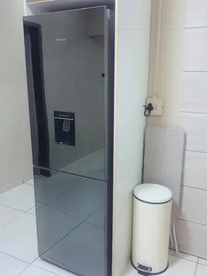 a glass shower in a bathroom with a trash can at KO'THABENG GUESTHOUSE in Lebowakgomo