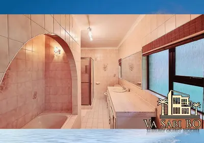 a bathroom with a tub and a sink and a bath tub at Va sabi bo, Best View, Luxury Family Villa in Hartbeespoort Dam in Hartbeespoort