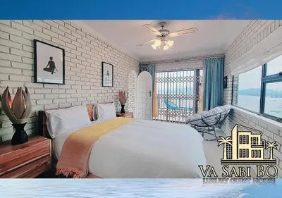 a bedroom with a large white bed and a window at Va sabi bo, Best View, Luxury Family Villa in Hartbeespoort Dam in Hartbeespoort